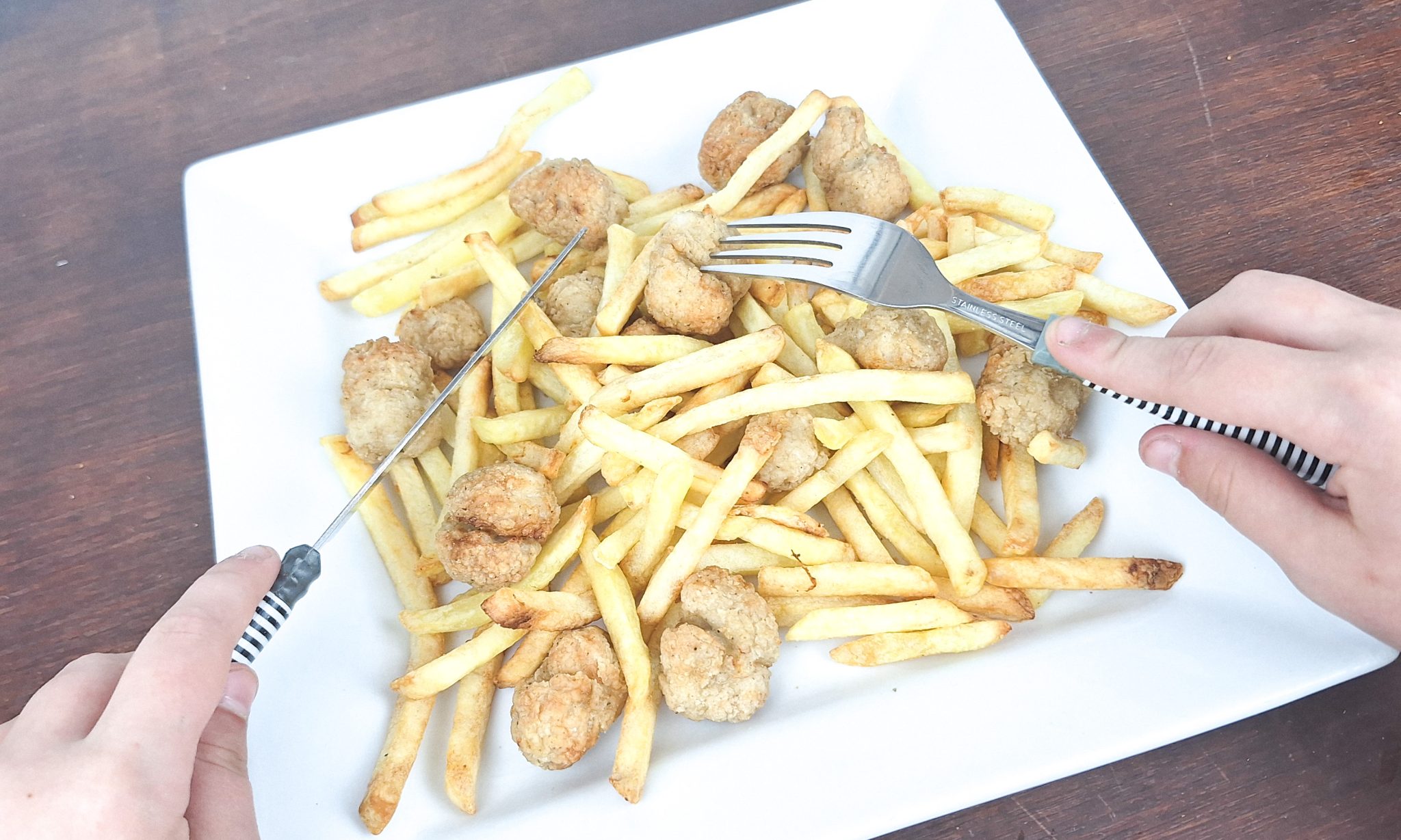 Child Eating Air Fryer Read Meal 