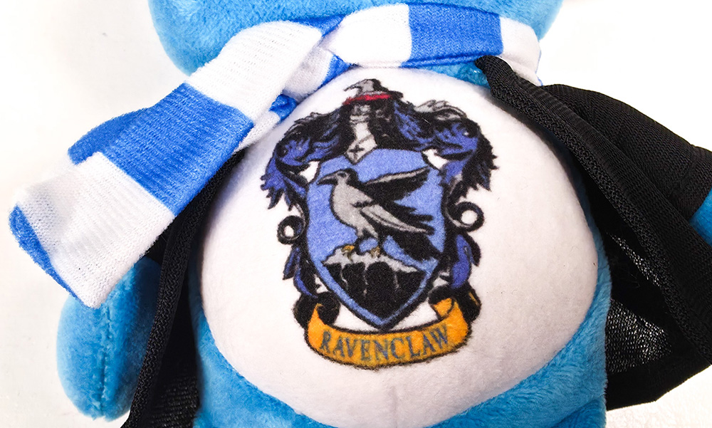 Care Bears x Harry Potter Ravenclaw emblem belly badge on Grumpy Bear