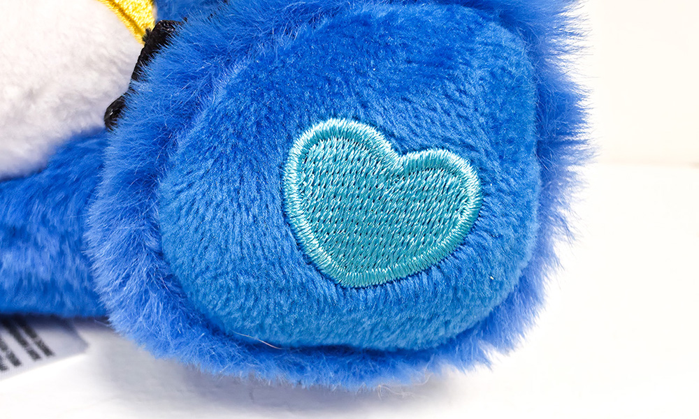 Care Bears x Harry Potter Wish Bear paw with heart and 25th anniversary sticker
