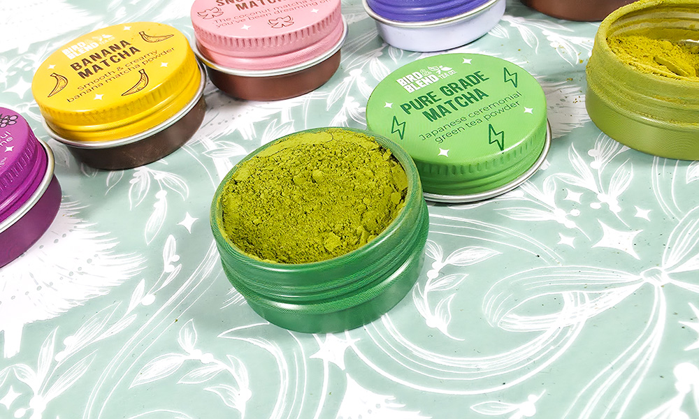 Bird and Blend Macha tins open