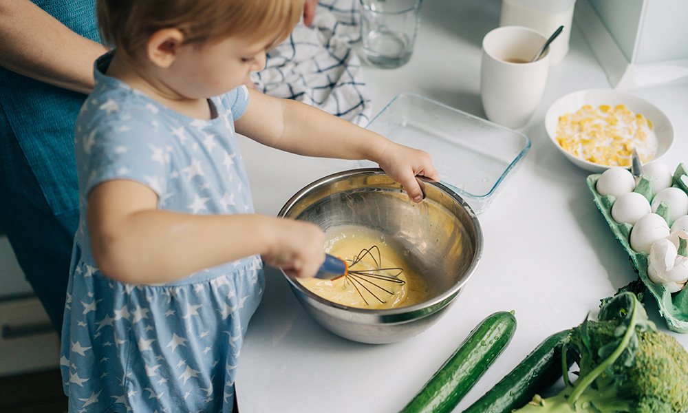 FAMILY HEALTH Child cooking Winter Wellness