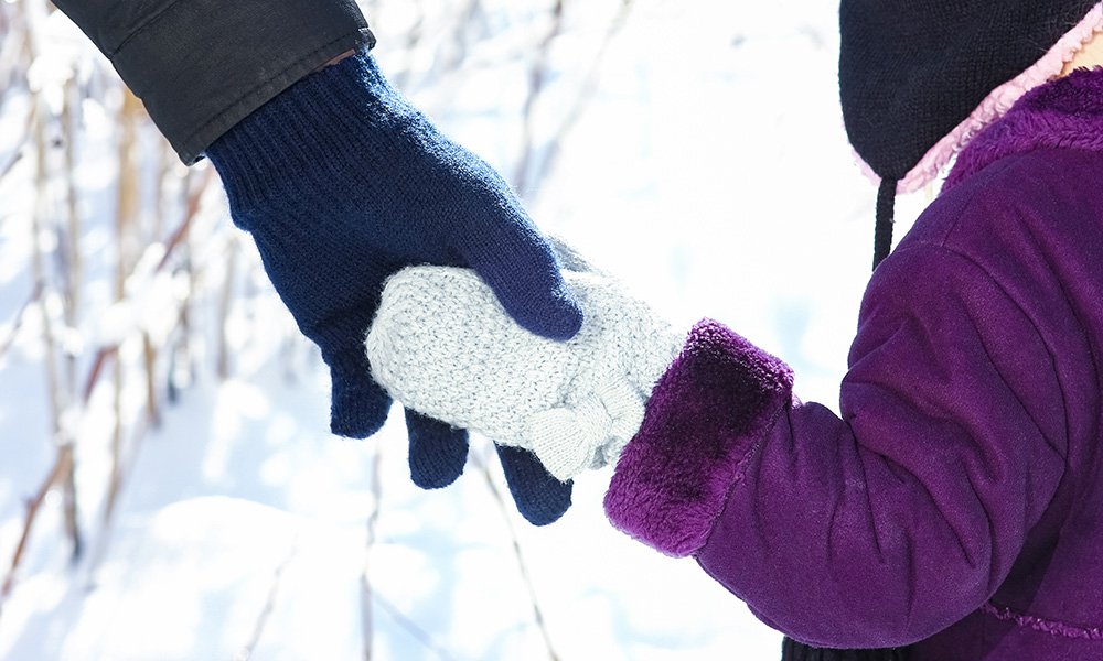 FAMILY HEALTH Child wearing winter gloves