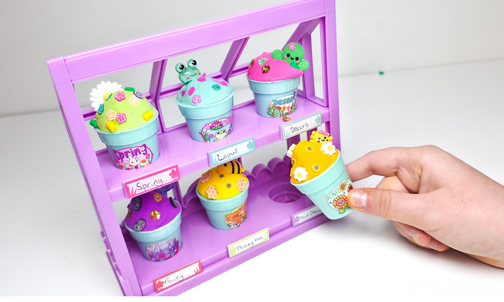 So Slime Flower Mini Garden greenhouse display showing all six completed scented slime flowerpots