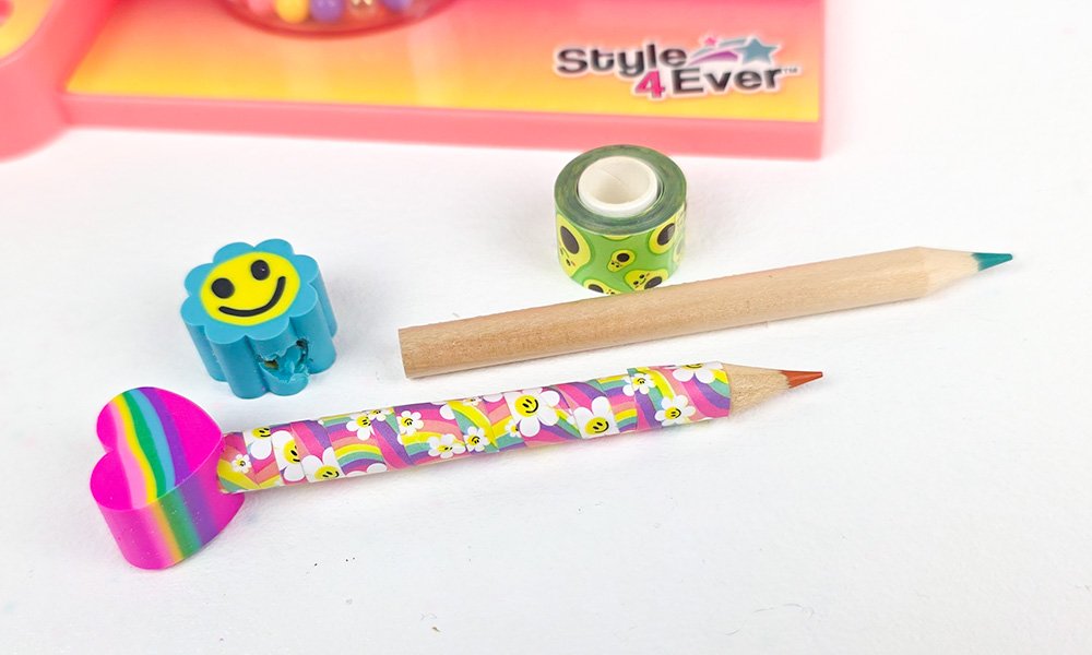Wrapped pencil with rubber topper