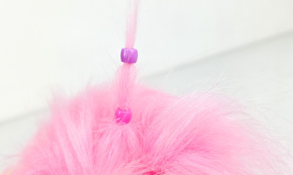 pink and purple bead on